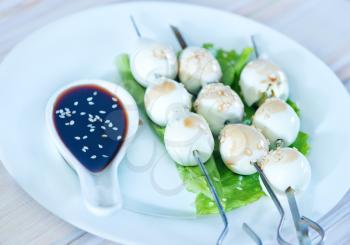 boiled eggs with white sesame and sauce