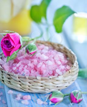 pink sea salt in bowl and on a table
