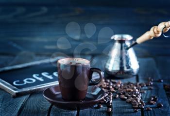 coffee beans on the wooden table, coffee background