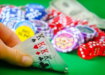 Card for poker in the hand, chips and card for poker