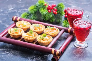 canape with red salmon on the bamboo tray