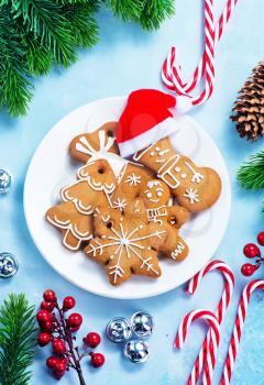 cookies and candycane on a table, christmas background