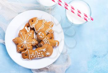 cookies and candycane on a table, christmas background