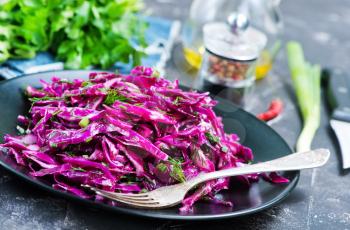 cabbage salad on plate and on a table