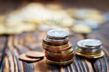 coins on a table, money on wooden table, stock photo