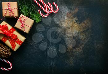 box for present and candy canes, christmas background