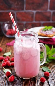 smoothie with fresh berries on a table