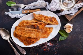 fried fish fillets on white plate, fried fish