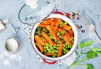 fried carrot with green peas, stock photo