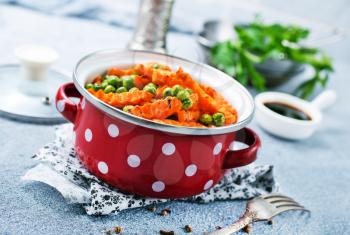 fried carrot with green peas, stock photo