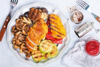 Homemade chicken breast barbecue. Delicious chicken barbecue and grilled vegetables for lunch or dinner