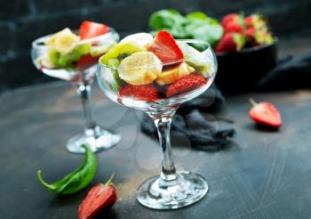fruit salad in glass, fresh fruits, diet food