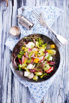 greek salad on plate on a table