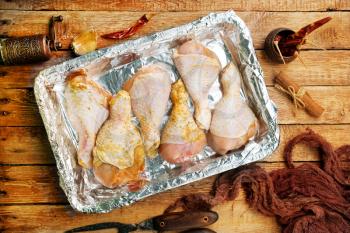 Chicken Legs, cooking Uncooked Chicken Legs, Uncooked Chicken with salt and spice