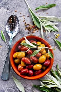 olives in bowl and on a table