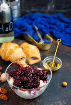 chia desert with blackberry jam and nuts