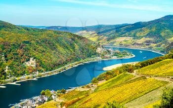 View of the Upper Middle Rhine Valley with Rheinstein and Reichenstein Castles. UNESCO world heritage in Germany