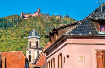 Saint-Hippolyte village with Haut-Koenigsbourg castle on top of a mountain - Haut-Rhin, France