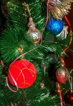 Christmas toys on the artificial Christmas tree
