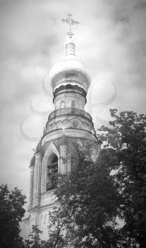 The Russian Orthodox Church in the Vologda, Russia. Saint Sophia cathedral bell tower. Monochrome image