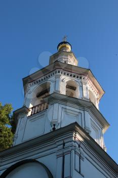 The Russian Orthodox Church in the Vologda city, Russia. Summer sunny day. Part of the bell tower