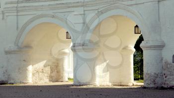 Courtyard of Spaso-Prilutsky Monastery in the Vologda city, Russia. Summer sunny day. White church portal