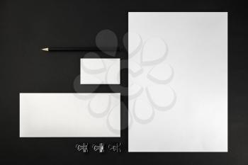 Blank stationery and corporate identity template on dark background.  For design presentations and portfolios. Top view. 
