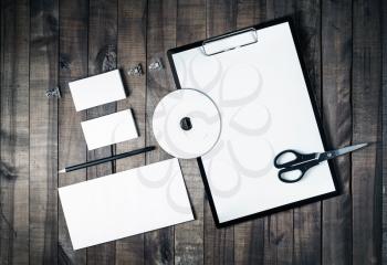 Blank stationery and corporate identity template on vintage wooden background. Responsive design mock up. Blank objects for placing your design. Top view.