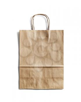 Blank craft paper bag on white background. Responsive design mockup. Isolated with clipping path.