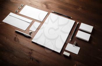 Blank white stationery set. Business brand template on wooden background.