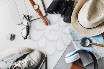 Outfit of traveler and vacation items. Overhead view of travel accessories. Flat lay.