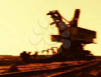 Horizontal vibrant sepia cyberpunk mining machine blurred background backdrop
