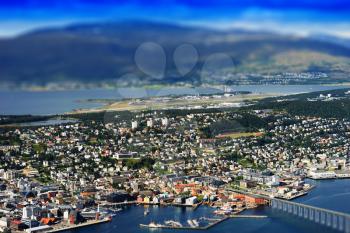 Tilt-shifted micro toy Tromso city with bridge background hd