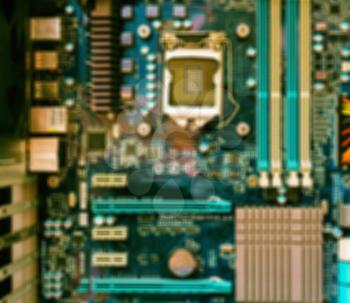 Horizontal vivid vintage computer motherboard pcb bokeh blur background backdrop