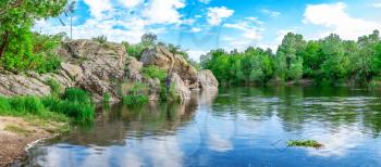 Southern Bug river in Mygiya village, Ukraine, on a sunny summer day