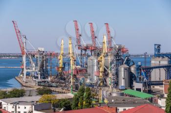 Odessa, Ukraine 09.16.2019. Harbor cranes in the cargo port and container terminal in Odessa, Ukraine, on a sunny day
