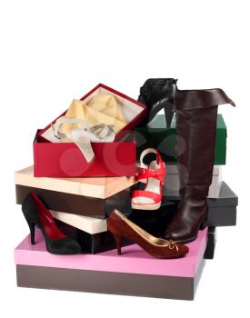 Female shoes and cardboard boxes isolated on white background