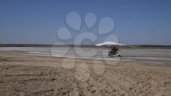 Russia, Veselovka - September 6, 2016: trike on the salt lake. Preparing for flight.