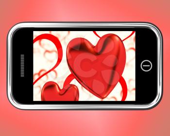 Red Hearts On Mobile Showing Love And Romance