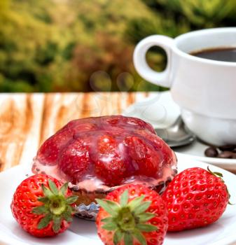 Coffee And Desert Showing Strawberry Tart Pie And Strawberry Tart