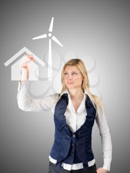 Autonomous power supply concept. Business woman presents the future of the house with self-contained power consumption