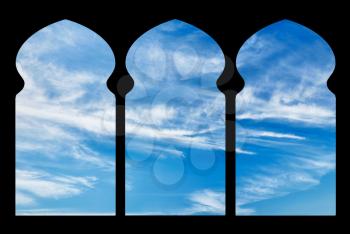 Silhouette arches inside the building of the mosque against the sky