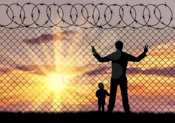 Concept of the refugees. Silhouette of father and child refugees against the background of the fence