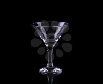 silhouette of martini glass on black background