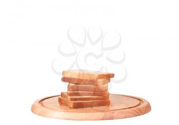 Sliced bread on a wooden chopping board isolated on white