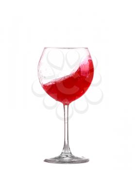 red wine splashing in a glass, isolated on white