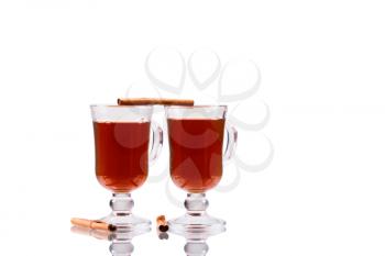two cups of tea cinnamon isolate on a white background