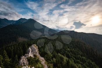 amazing nature, summer in the mountains. Travel and hike. Tatra Mountains in summer time. beautiful panorama of agricultural area. gorgeous mountain ridge with high rocky peaks