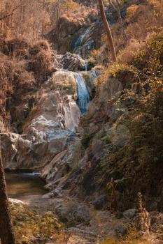 deep forest waterfall at Lan sang national park, Tak, Thailand. Tak Province Drought Season