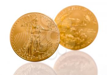 Pair of gold eagle one troy ounce golden coins from US Treasury mint